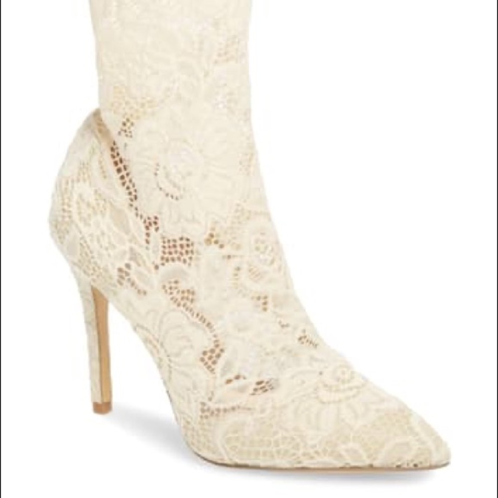 Lace heeled booties. Never been worn!